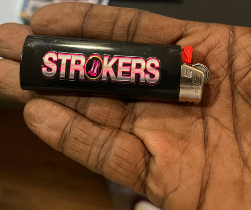 Black lighter with pink and white Strokers logo